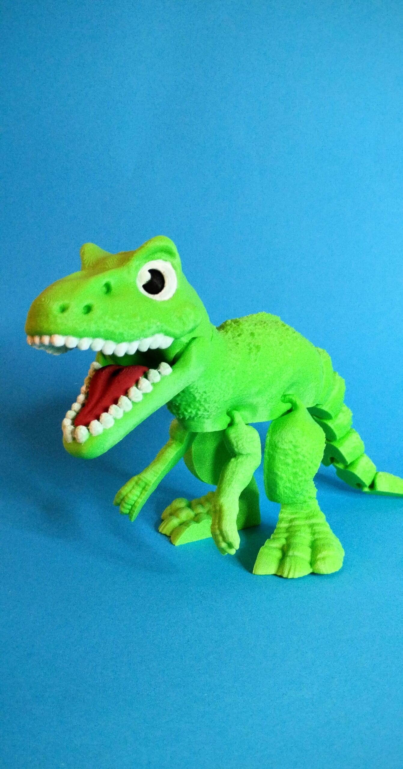 Lastele mõeldud roheline 3D-prinditud dinosaurus.